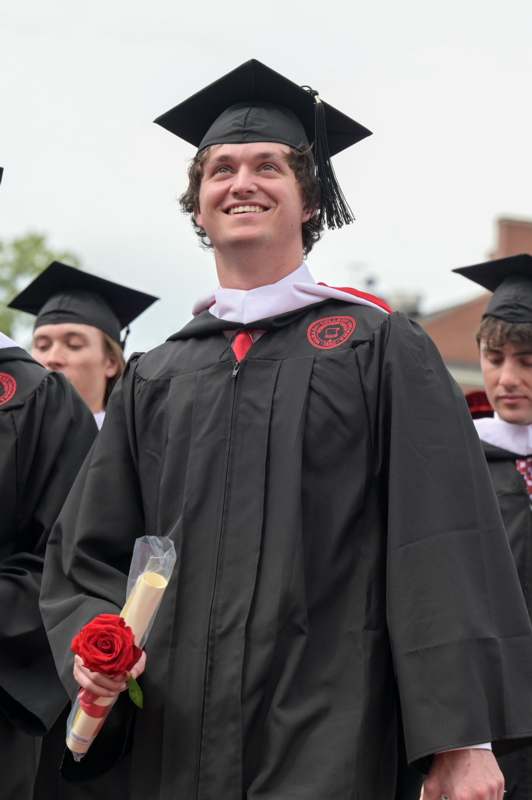 a man in a graduation gown