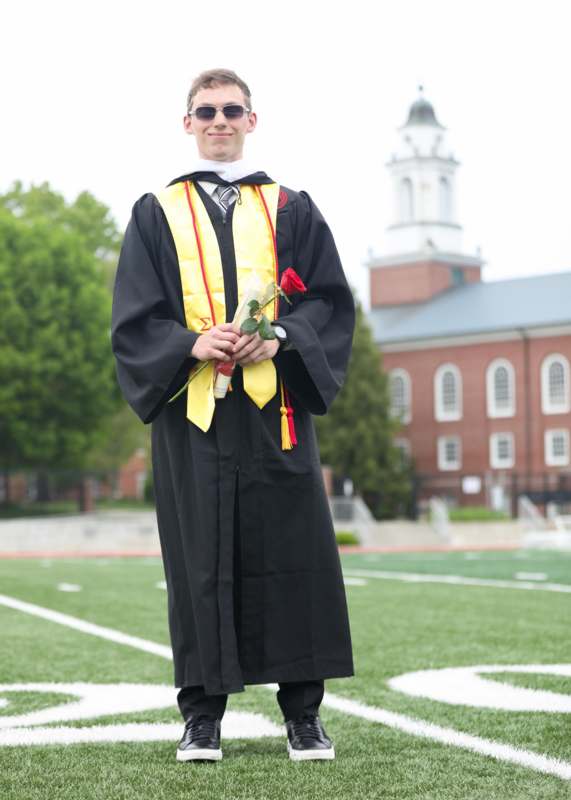 a man in a graduation gown