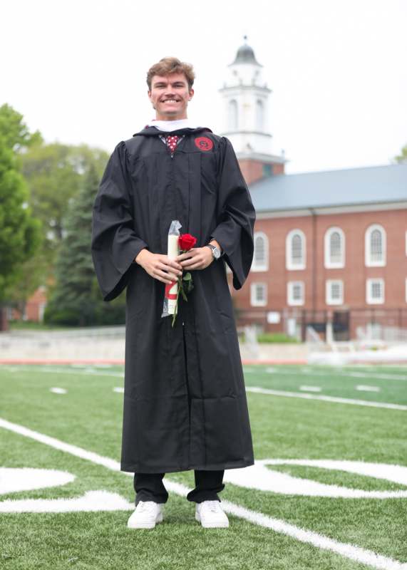a man in a graduation gown
