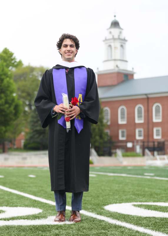 a man in a graduation gown