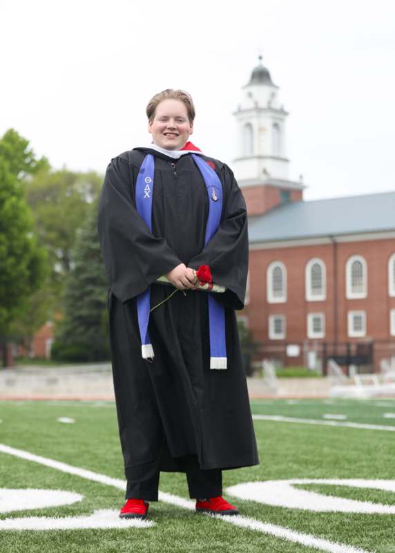 a person in a graduation gown