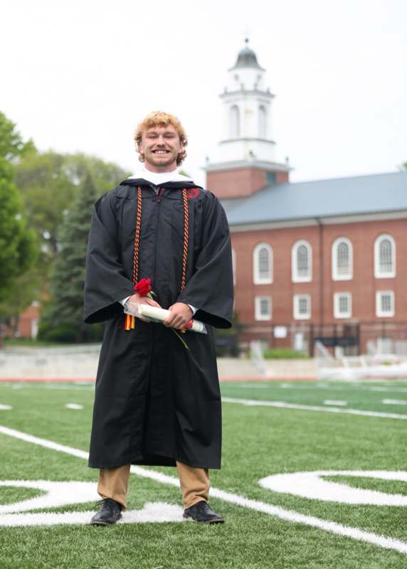 a man in a graduation gown