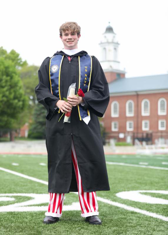 a man in a graduation gown