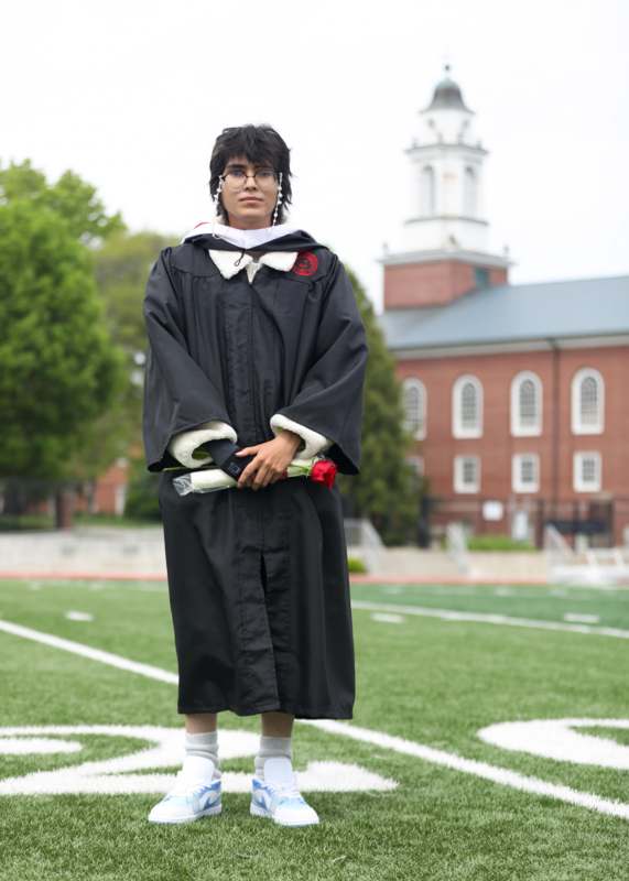 a man in a graduation gown