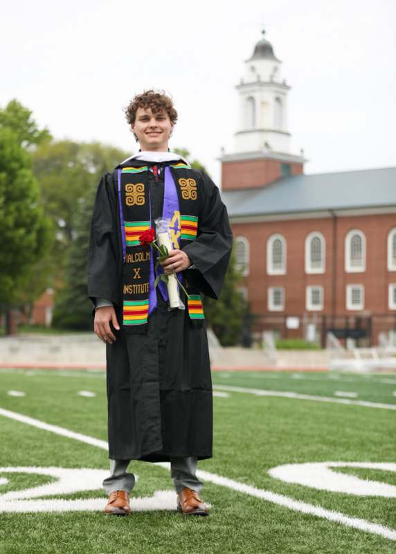 a man in a graduation gown