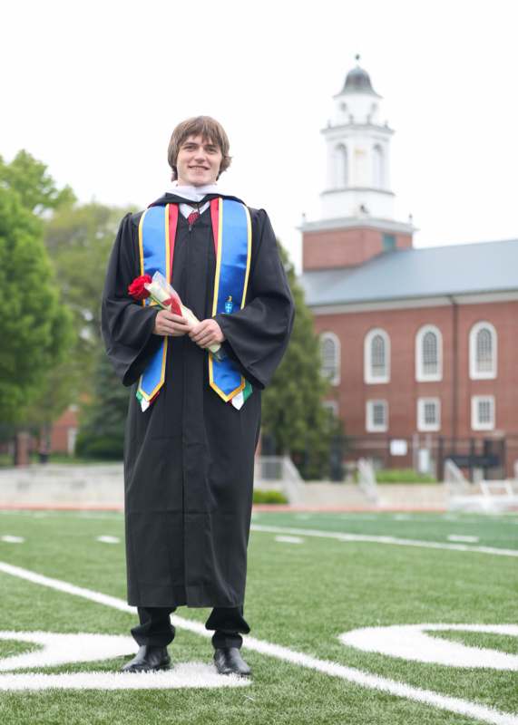 a man in a graduation gown