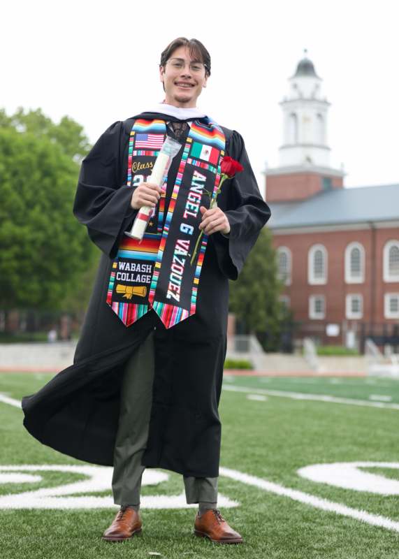 a man in a graduation gown