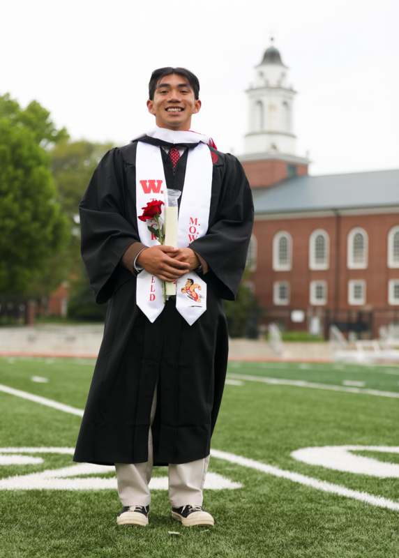 a man in a graduation gown