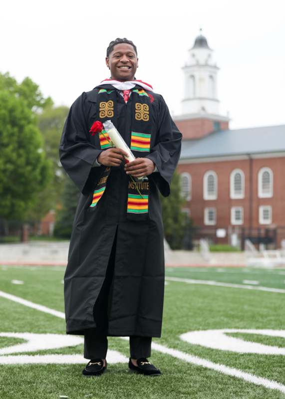 a man in a graduation gown