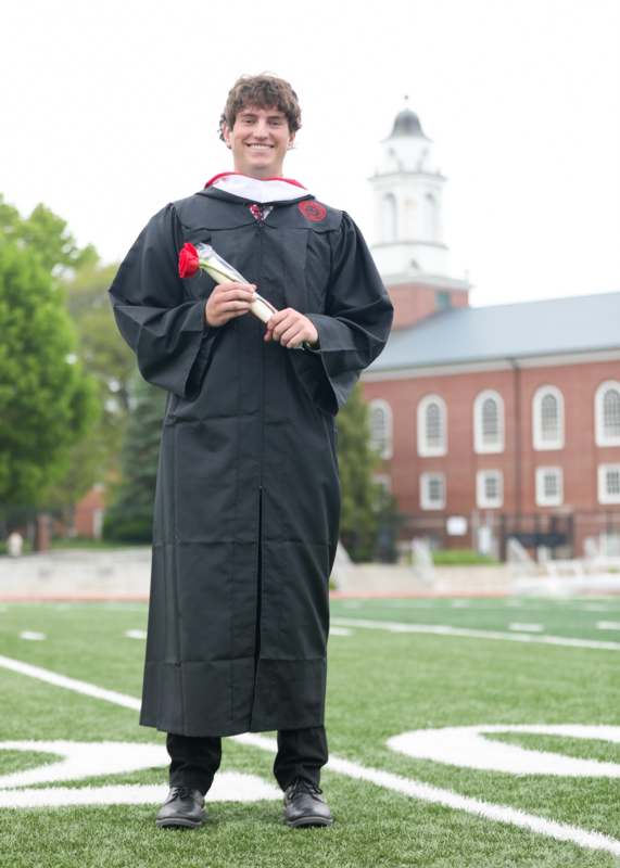 a man in a graduation gown