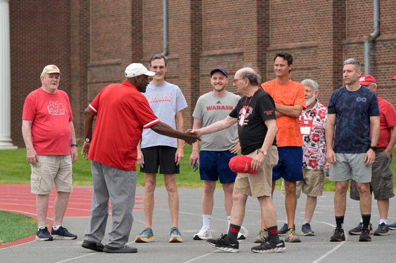a group of people shaking hands