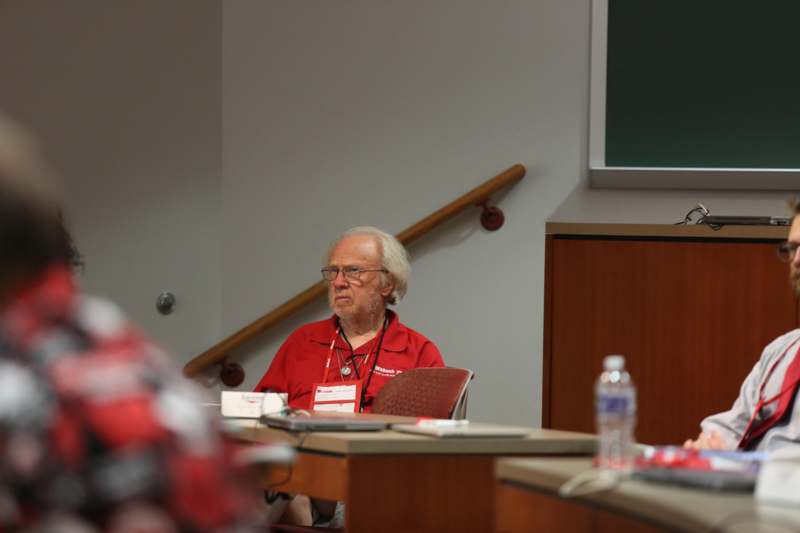 a man in a red shirt