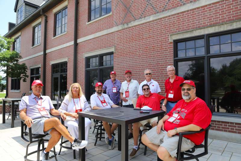 a group of people sitting at a table