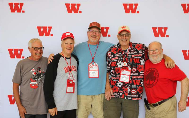 a group of people posing for a photo