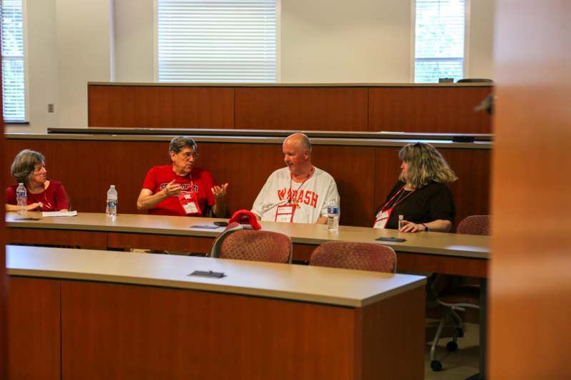 a group of people sitting at tables