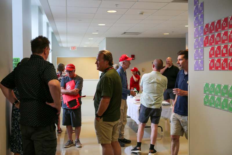 a group of people standing in a room