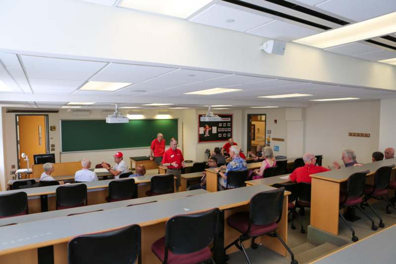 a group of people in a classroom