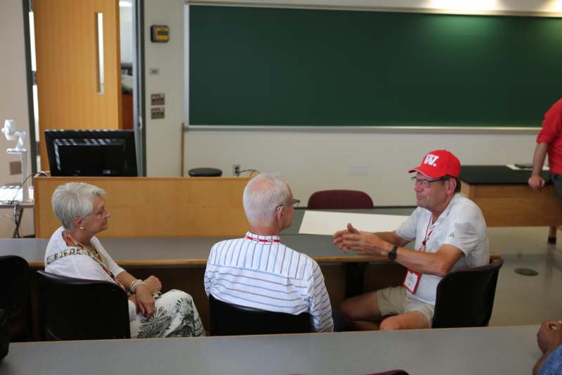 a group of people sitting at a table