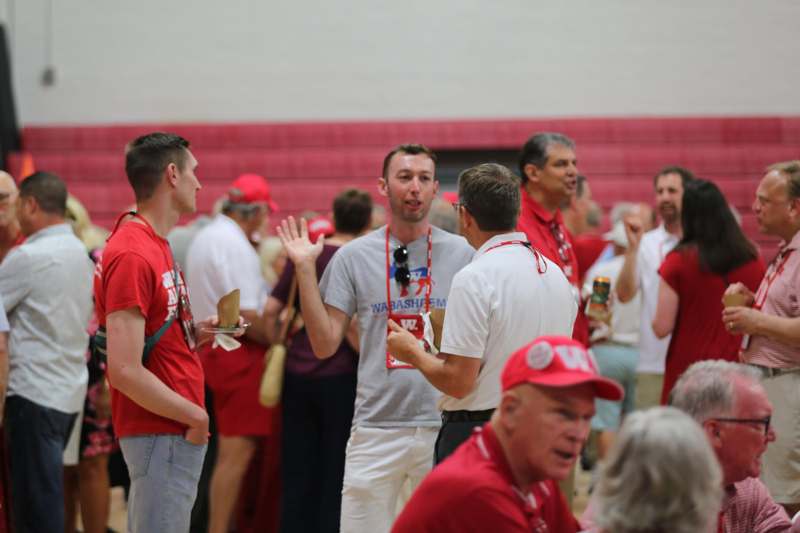 a group of people in a gym