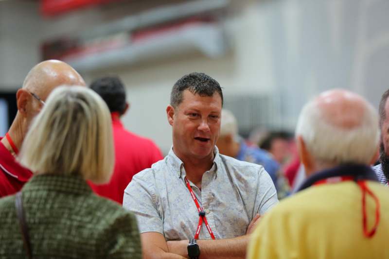 a man standing in a crowd