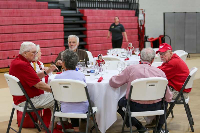 a group of people sitting around a table