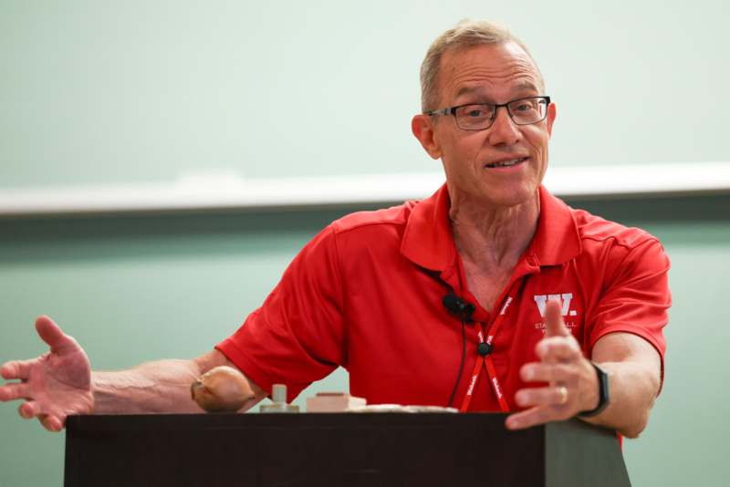 a man in a red shirt