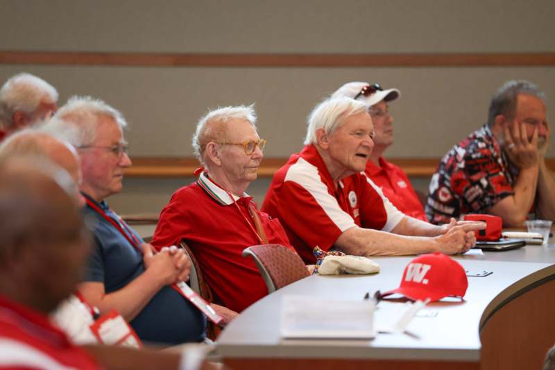 a group of people sitting at a table