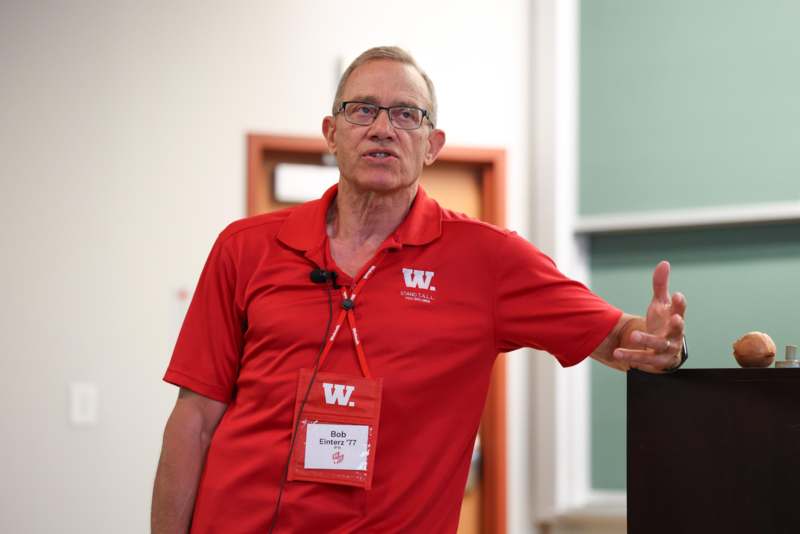 a man wearing a red shirt
