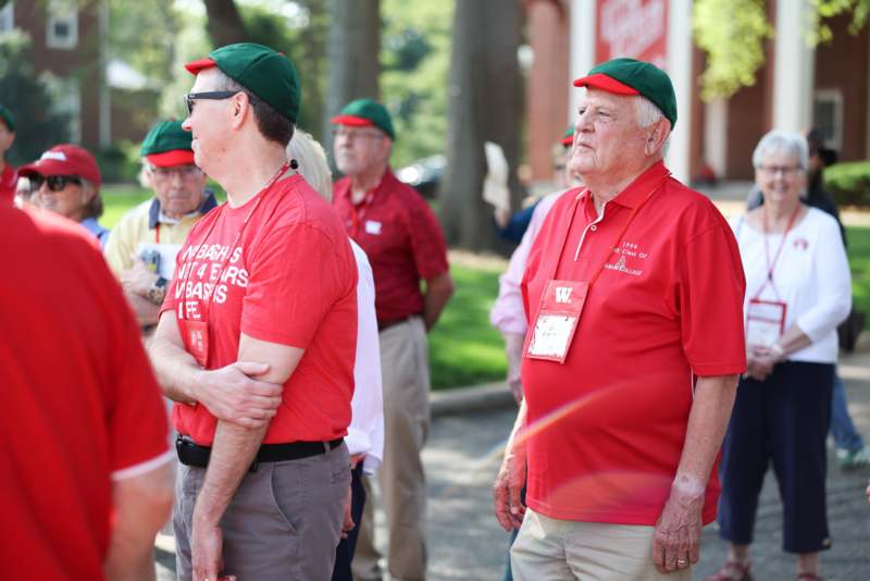 a group of people wearing matching outfits