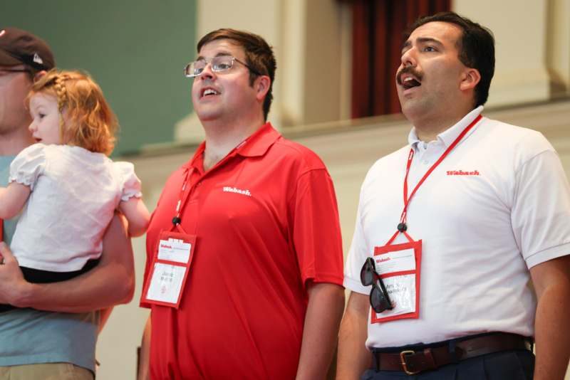 a group of people standing in a room