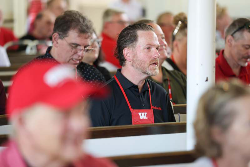 a man sitting in a church