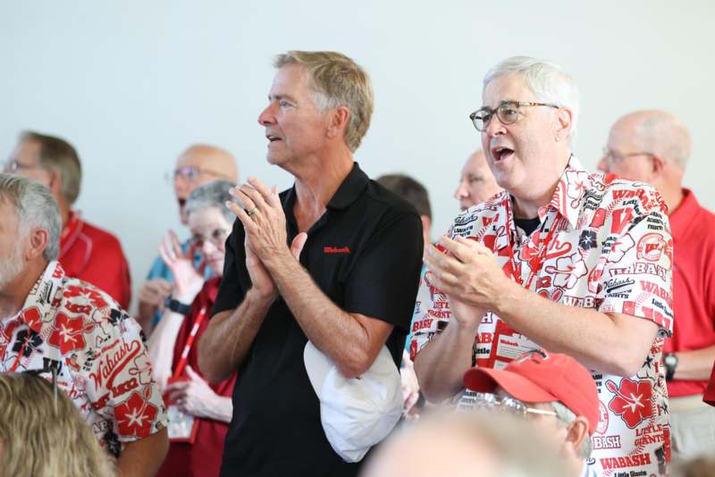 a group of people clapping
