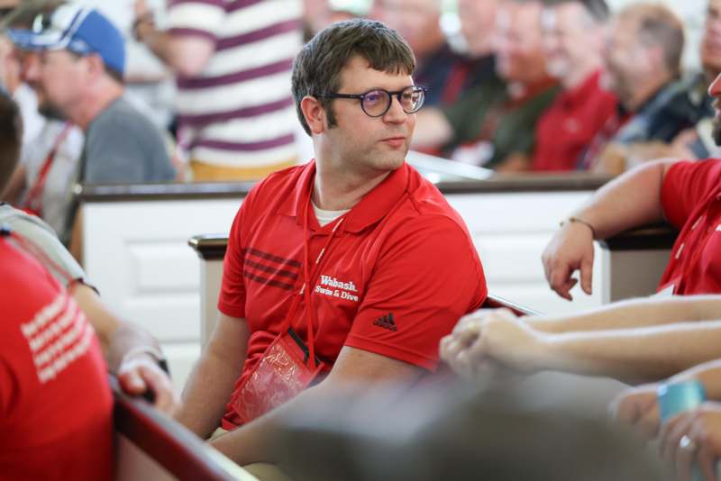 a man in a red shirt