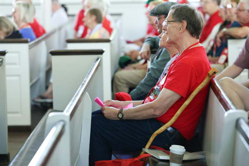 a group of people sitting in chairs