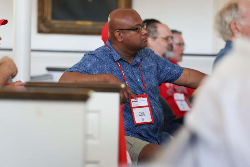 a man wearing a name tag