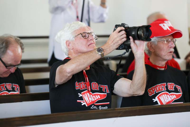 a man taking a picture of a man