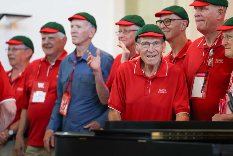 a group of men wearing matching outfits