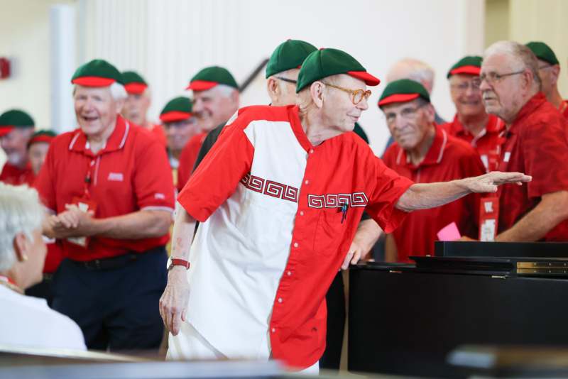 a group of men wearing matching outfits