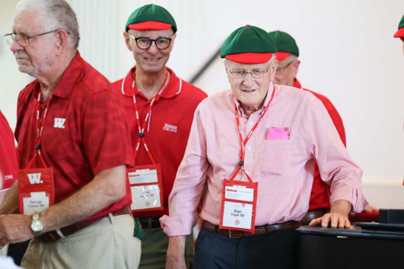 a group of men wearing matching outfits