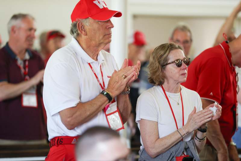 a man and woman clapping