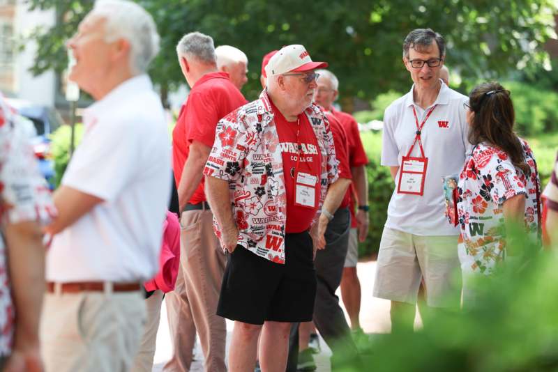 a group of men wearing red shirts