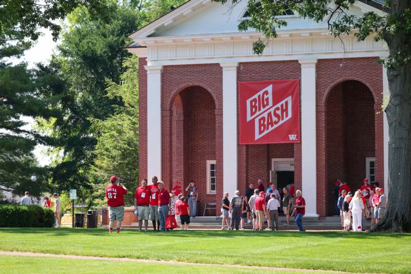 a group of people outside of a building