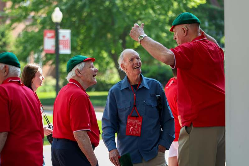 a group of old men laughing