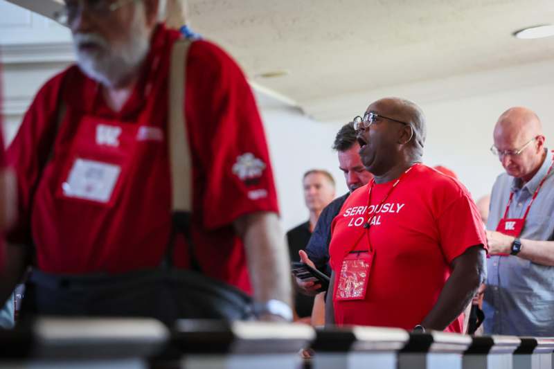 a man in red shirt with a man in a red shirt