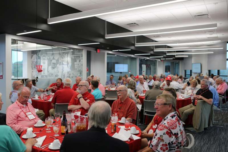 a group of people sitting at tables