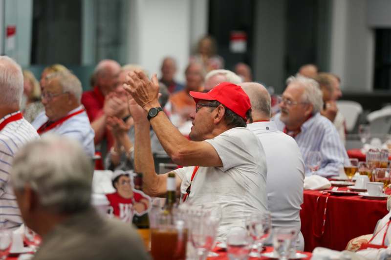 a group of people sitting at a table