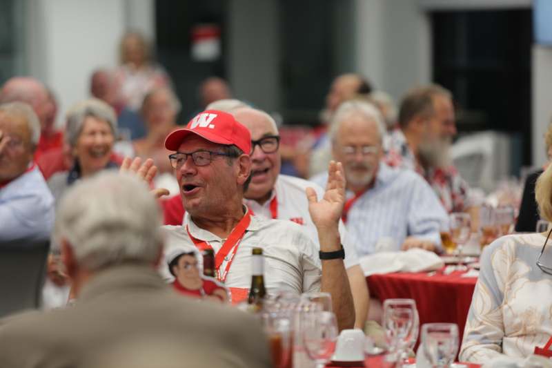 a group of people sitting at a table