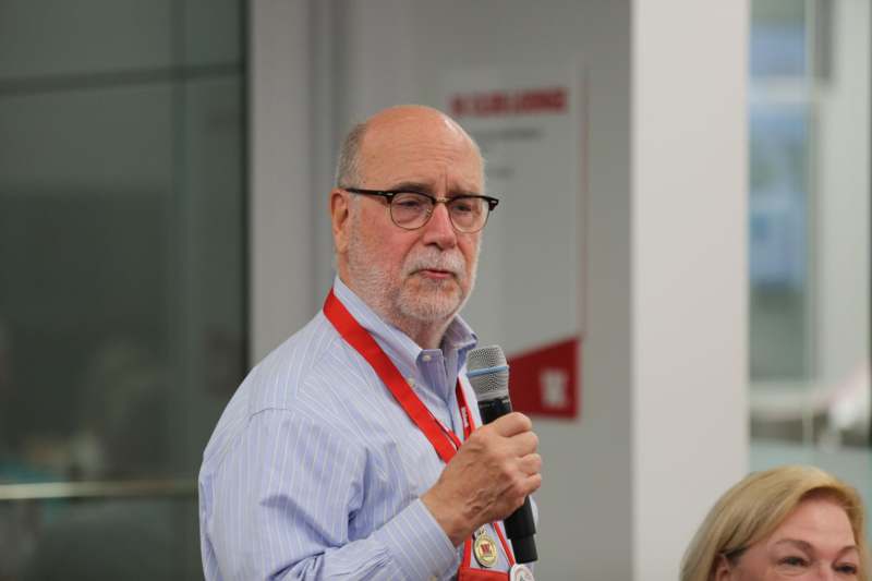 a man holding a microphone