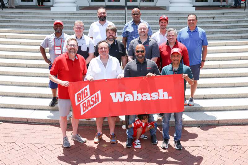 a group of people posing for a photo