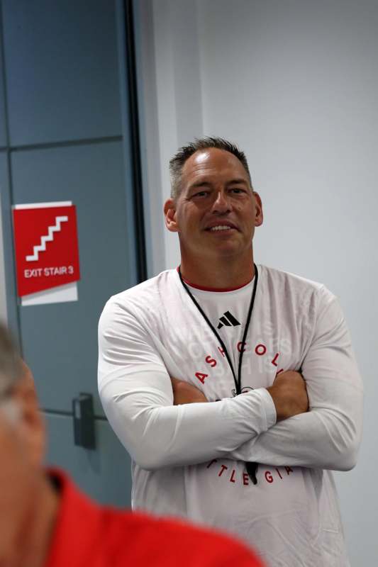 a man with his arms crossed